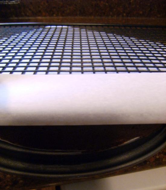 Chocolate Ugly Cake being removed from the pan.