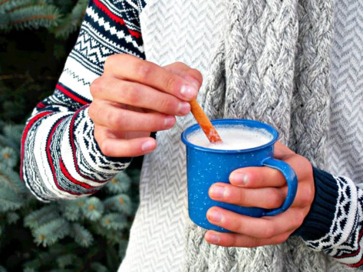 Hot-Buttered-Rum is a delightful holiday cocktail made with sweetened butter, hot frothed milk, warm spices, and a splash of spirits (adults only) or rum extract (for all ages).