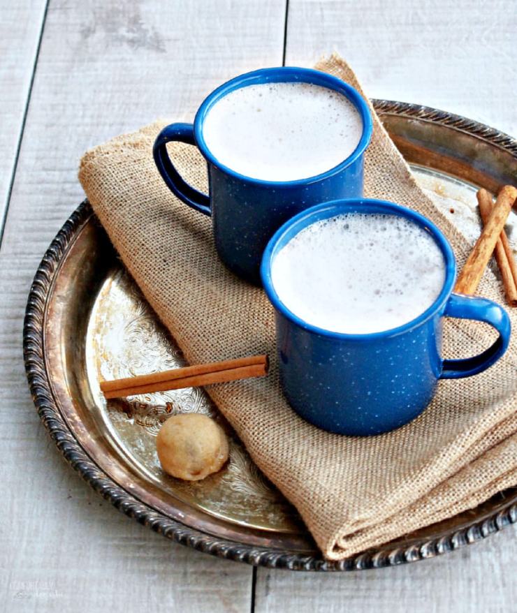 Hot-Buttered-Rum is a delightful holiday cocktail made with sweetened butter, hot frothed milk, warm spices, and a splash of spirits (adults only) or rum extract (for all ages).