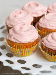 Strawberry Lemonade Cupcakes from scratch - Bright and tangy lemon cupcakes made from scratch and topped with a glorious fresh strawberry buttercream frosting is a delightfully crave-able combination. | ComfortablyDomestic.com