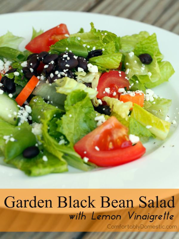 Black beans, crisp greens, fresh vegetables, and Cotija cheese, brightly dressed in a simple lemon vinaigrette. This is a delicious healthy salad recipe! | ComfortablyDomestic.com