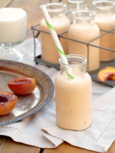 Honey Roasted Peach Smoothies have a touch of butter and honey to bring out the nutty sweetness. Blended with yogurt and milk for a simply delicious smoothie. | ComfortablyDomestic.com