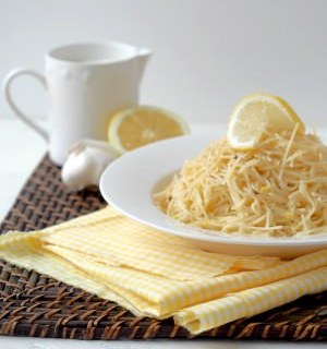 Easy lemon cream pasta is delicate angel hair pasta, bathed in lemony cream sauce. It's simple enough for busy weeknights, but luxurious enough for easy entertaining. | ComfortablyDomestic.com