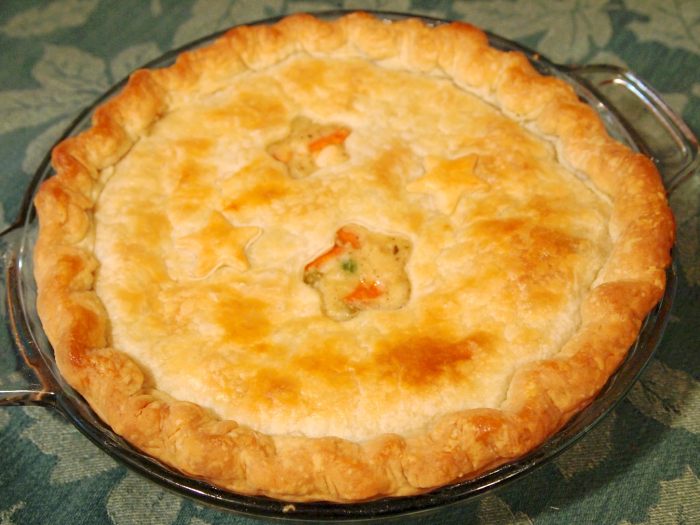 Chicken pot pie. Nothing says 'comfort food' better than tender chicken and vegetables in a rich gravy, covered with a flaky, buttery pastry crust. | Recipe on ComfortablyDomestic.com