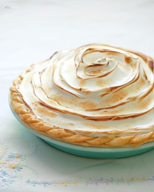 The-Best-Lemon-Meringue-Pie features exceptionally tangy lemon custard filling topped with toasted sweet meringue, cradled in a golden, buttery crust.