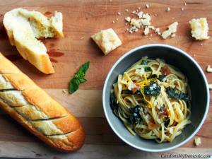 Lemon garlic linguine with kale is a delicious and easy to make weeknight dinner. Adding fresh kale gives this dish a burst of color and health benefits. | ComfortablyDomestic.com