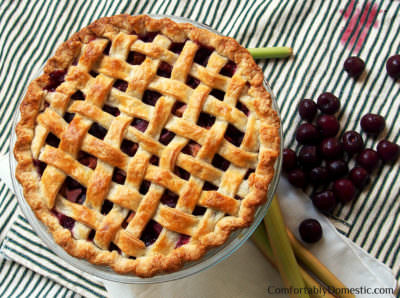 Sweet Cherry Rhubarb Pie marries plump sweet cherries with tart rhubarb for a juicy pie that’s bursting with summer sunshine in every bite.