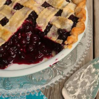 Perfect Blueberry Pie | ComfortablyDomestic.com | The BEST blueberry pie has juicy blueberries, a little lemon, and sugar nestled in a flaky all butter crust.