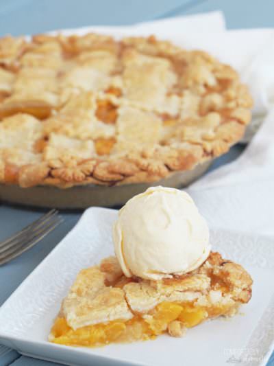 Red-Haven-Peach-Pie is made with fresh, ripe peaches tucked in a delicate all butter pie crust with a sprinkle of crunchy sugar on top for a classic peach pie to remember.