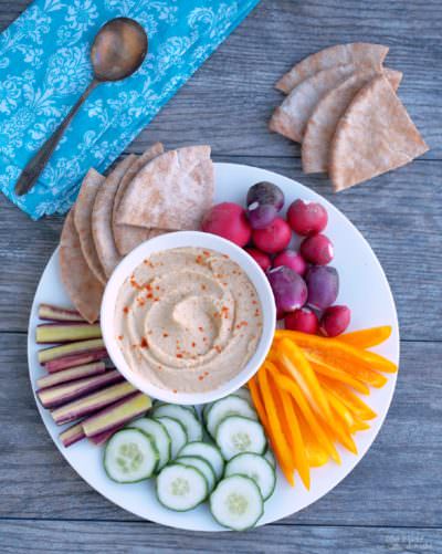 Skinny-Hummus-made-with-yogurt is nice and creamy with a healthy bite of garlic—low fat Greek yogurt cuts down on the extra calories found in traditional recipes.